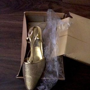 Gold pair of heels size 9